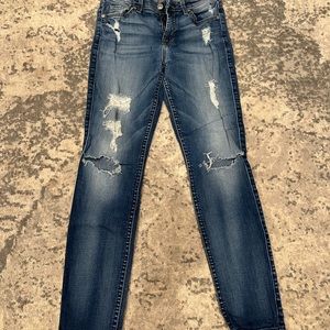 Women's size 26 7For All Mankind Skinny, distressed jeans.